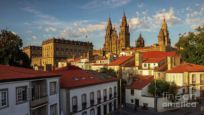 Santiago de Compostela Cathedral Spectacular View with Sun Light Hitting the facade and Tiled Roofs La Corua Galicia by Pablo Avanzini Santiago de Compostela Cathedral Spectacular View with Sun Light Hitting the facade and Tiled Roofs La Corua Galicia by Pablo Avanzini