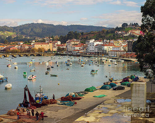 Fishermen Repairing Nets on the Beautiful Fishing Town of Pontedeume La Coruna Galicia by Pablo Avanzini Fishermen Repairing Nets on the Beautiful Fishing Town of Pontedeume La Coruna Galicia by Pablo Avanzini